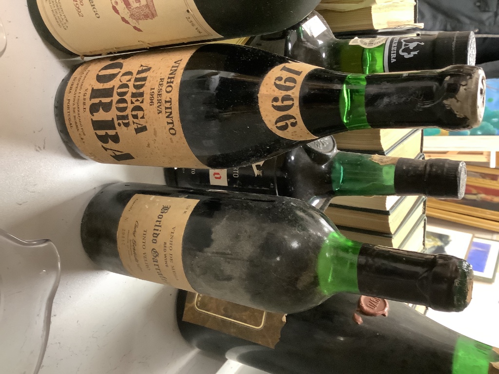 A small collection of port and red wine